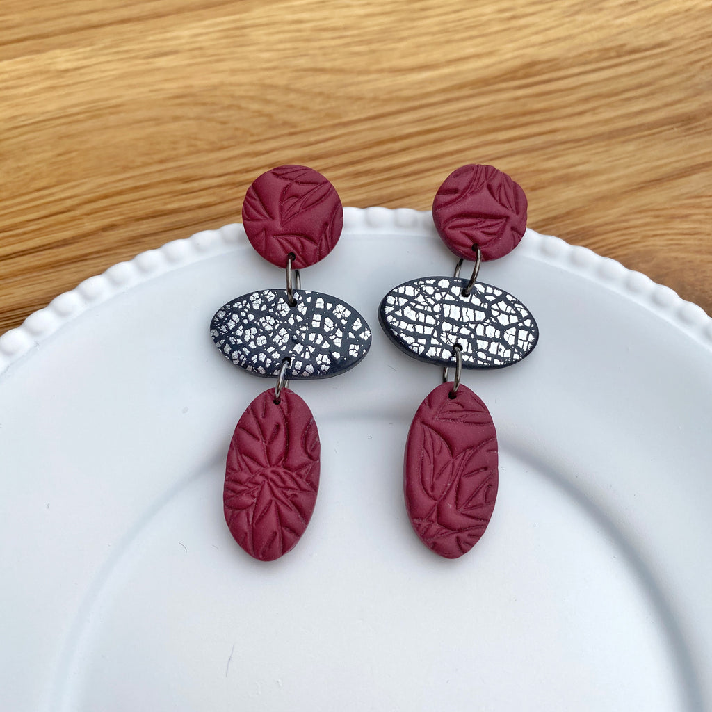 Oval trio drop, burgundy with silver statement earring