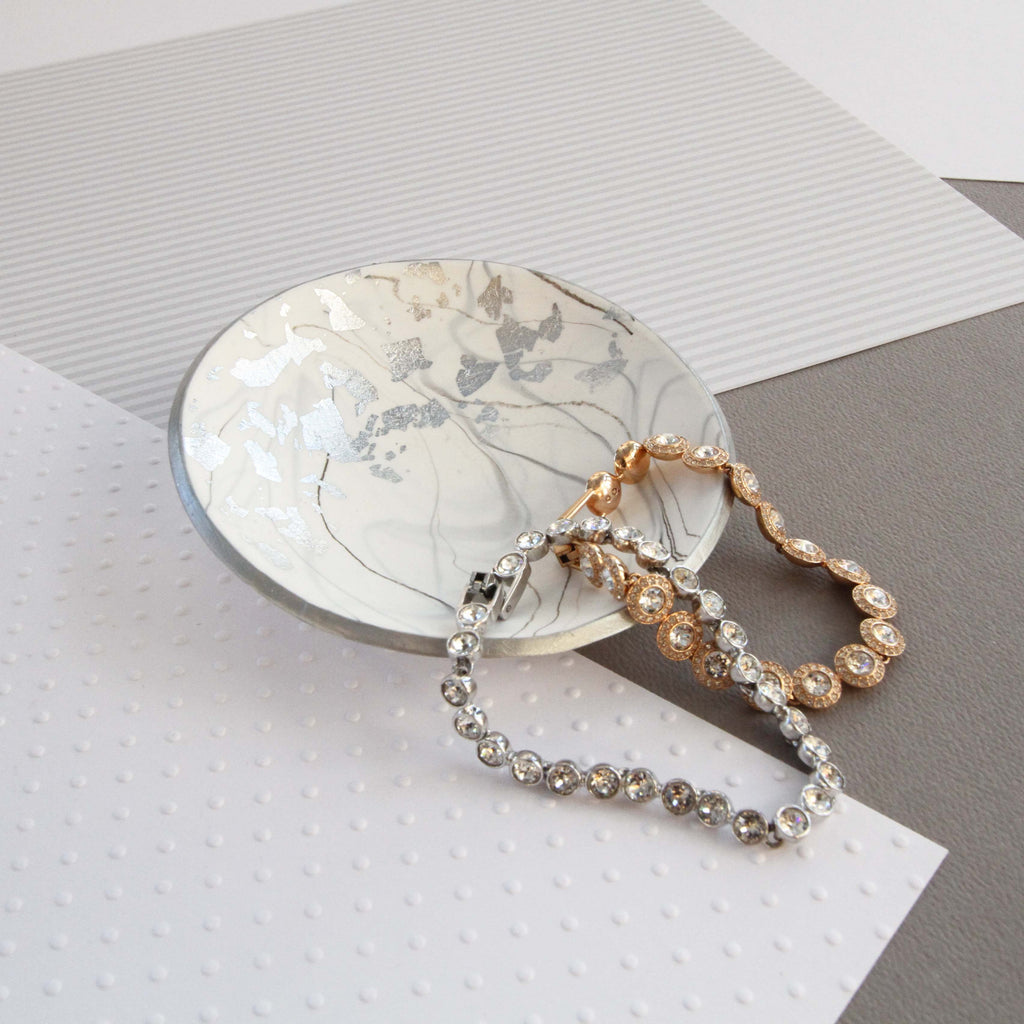White marble and silver trinket dish