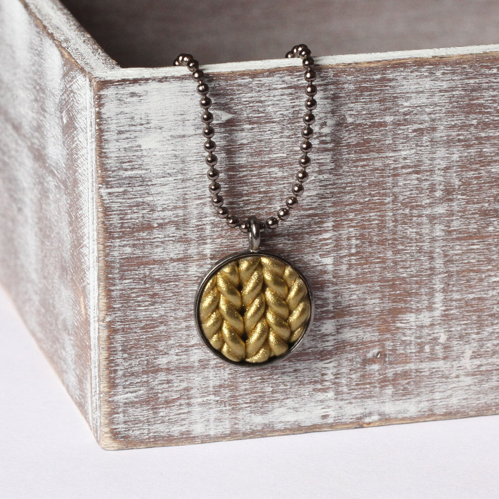 Metallic gold Knitted clay pendant