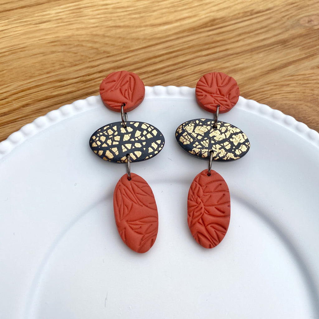 Oval trio drop, burnt orange with gold statement earrings