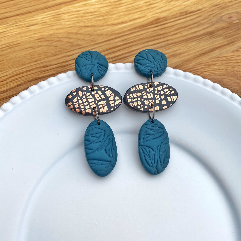 Oval trio drop, teal with copper statement earring