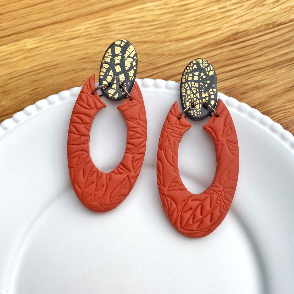 Oval donut burnt orange and gold statement earrings