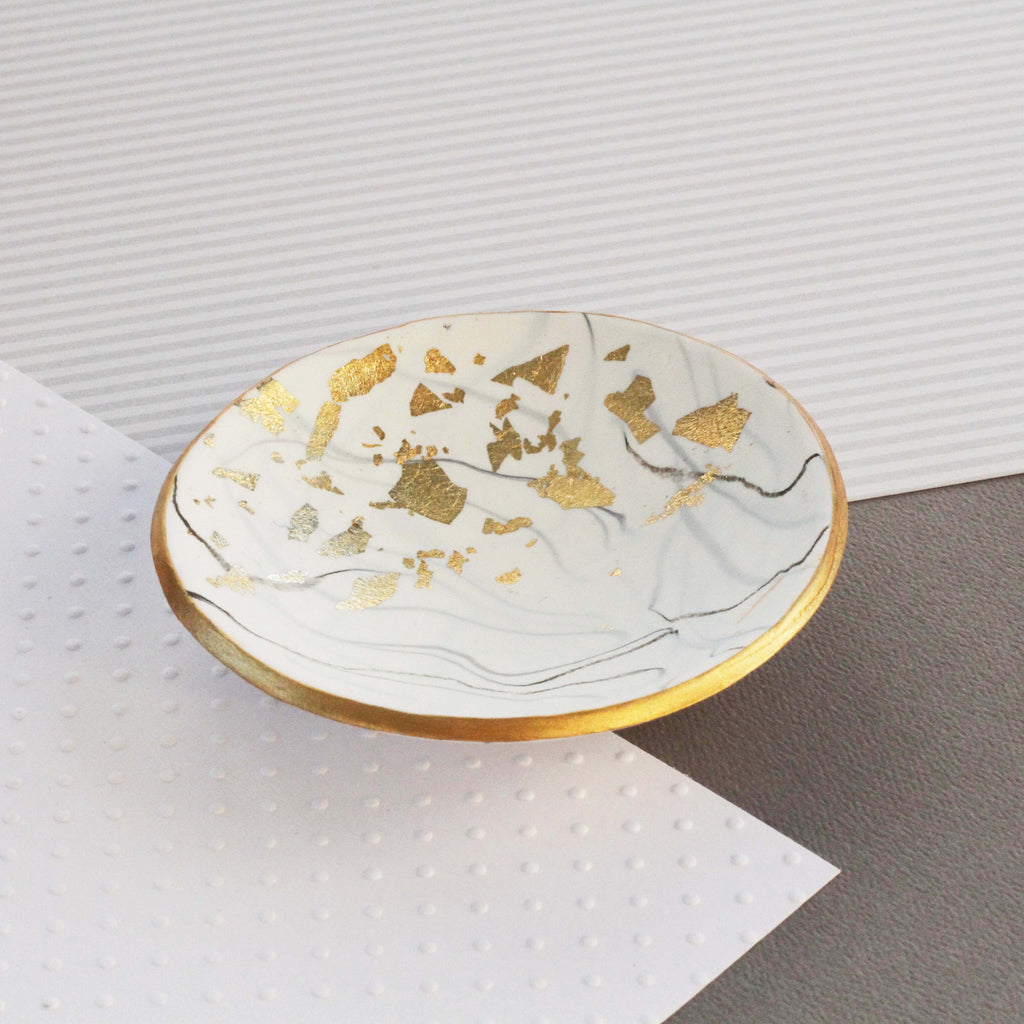 White marble and gold trinket dish