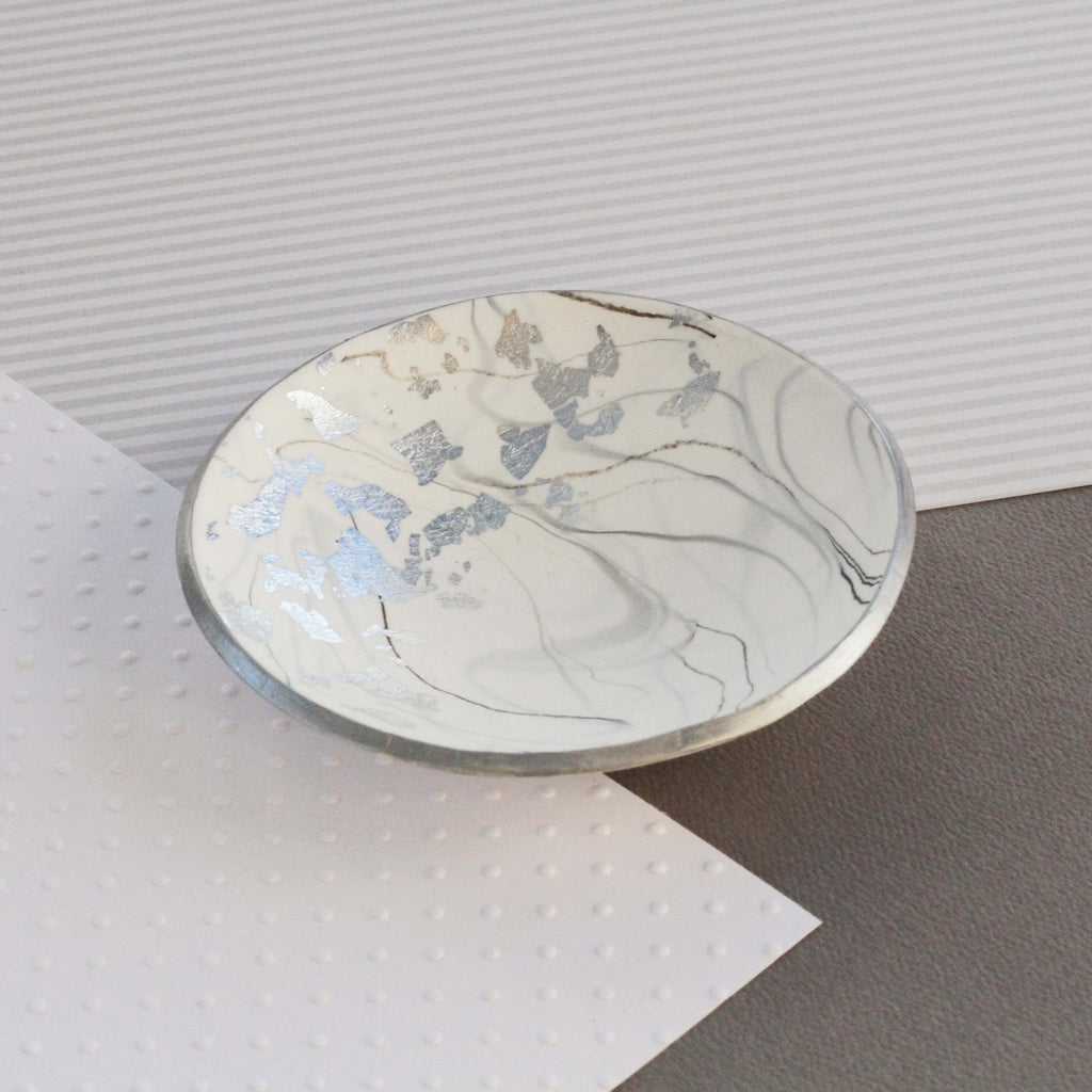 White marble and silver trinket dish