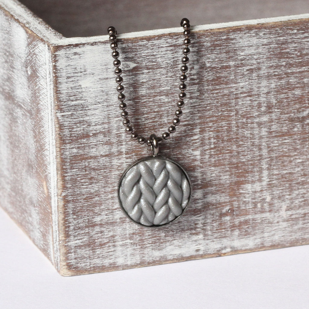 Metallic silver Knitted clay pendant