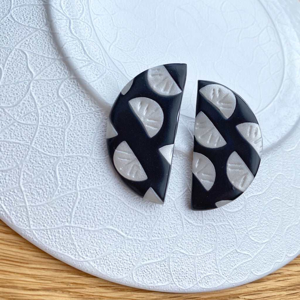 Black with pearl segment pattern statement earrings - large semi circle stud