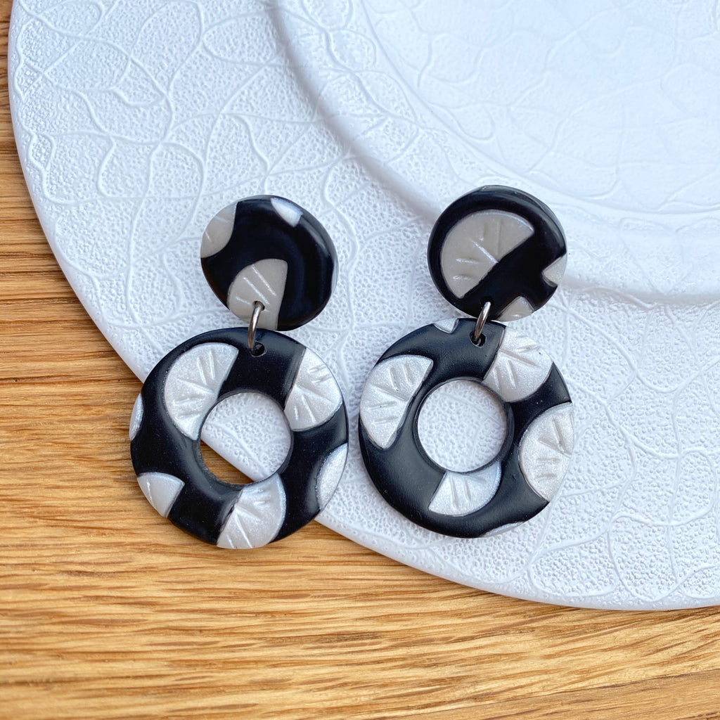 Black with pearl segment pattern statement earrings - donut drop